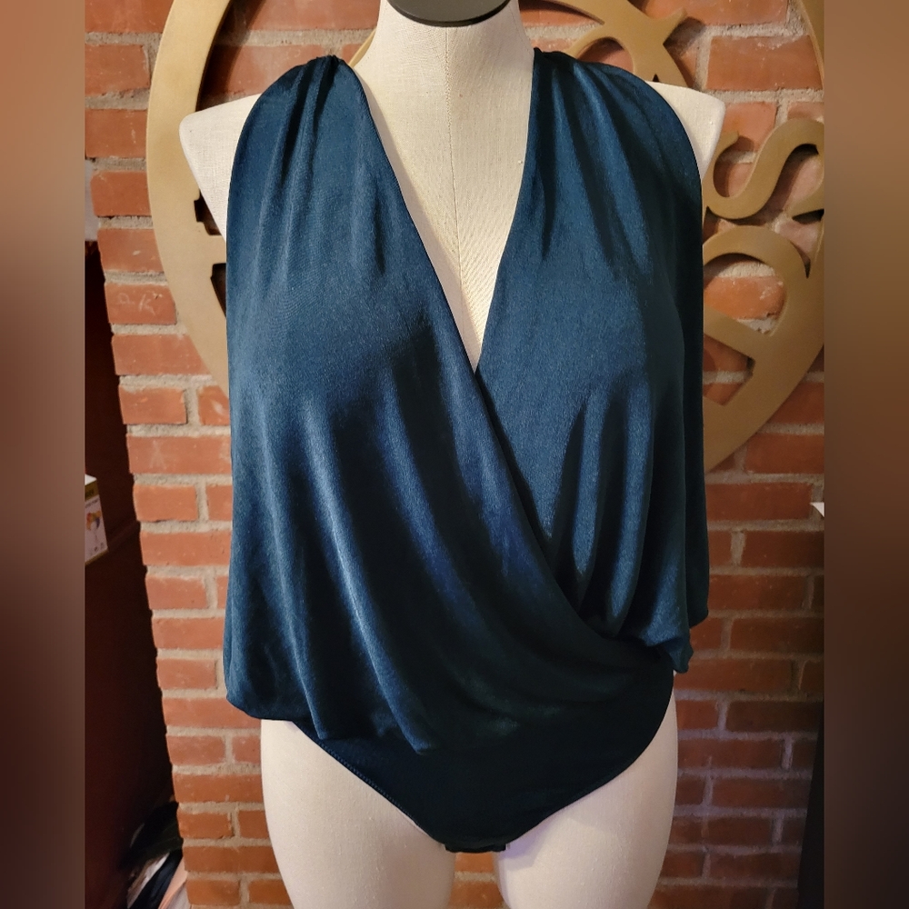 Free People New with tags drape bodysuit. Size XL